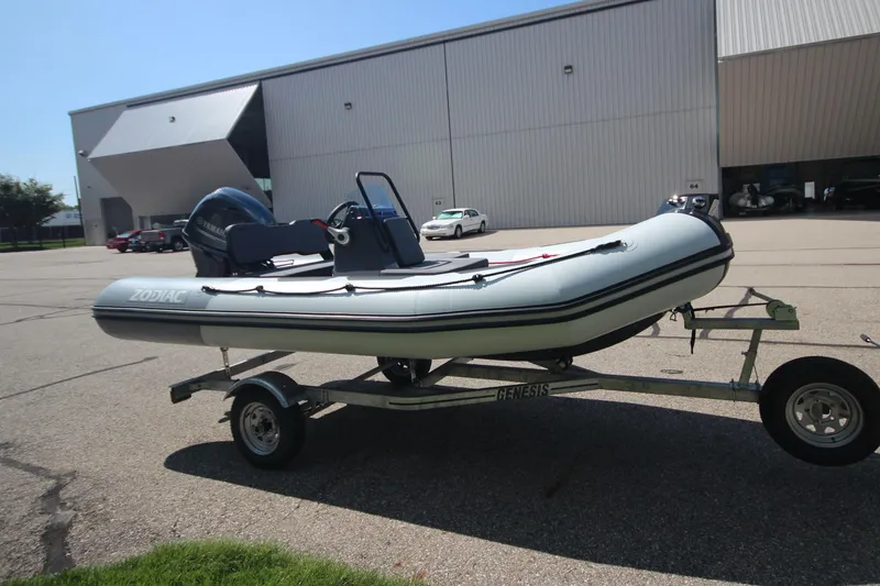 Slide: The Image of Zodiac Open 4.2 NEO 50hp boat on trailer, year 2026. - 2