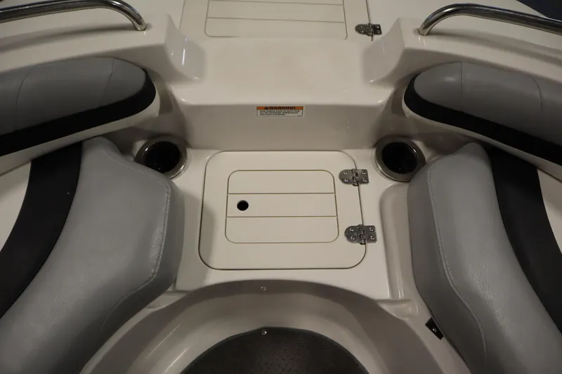 Slide: The Image of 2015 Starcraft 1915 OB Limited boat interior with seating and storage compartments. - 13