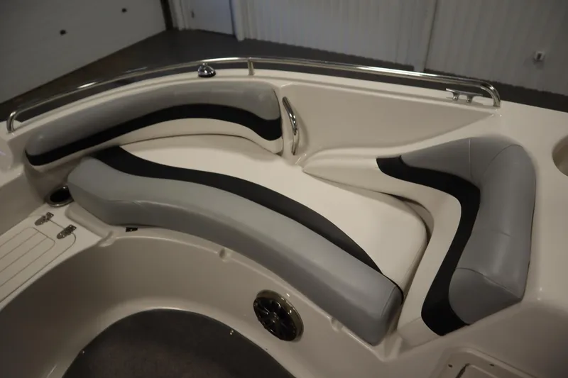 Slide: The Image of 2015 Starcraft 1915 OB Limited boat interior with cushioned seating. - 15