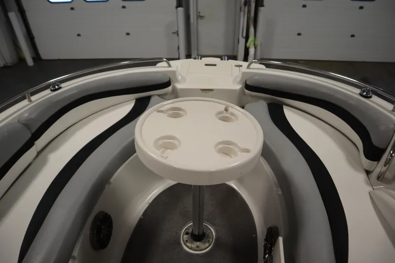 Slide: The Image of 2015 Starcraft 1915 OB Limited boat interior with seating and round table. - 18