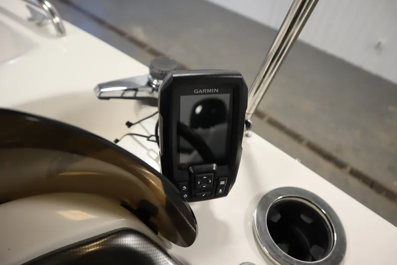 Slide: The Image of Garmin device on 2015 Starcraft 1915 OB Limited boat dashboard, close-up view. - 24