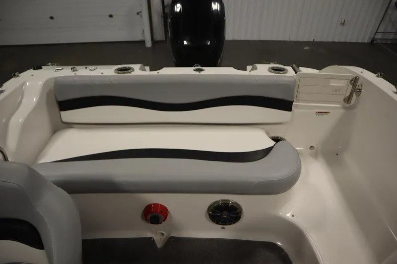 Slide: The Image of 2015 Starcraft 1915 OB Limited boat interior with gray and black seating. - 32