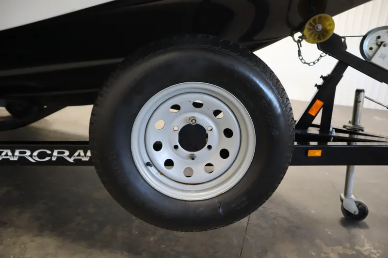 Slide: The Image of Trailer wheel of 2015 Starcraft 1915 OB Limited boat on display. - 41