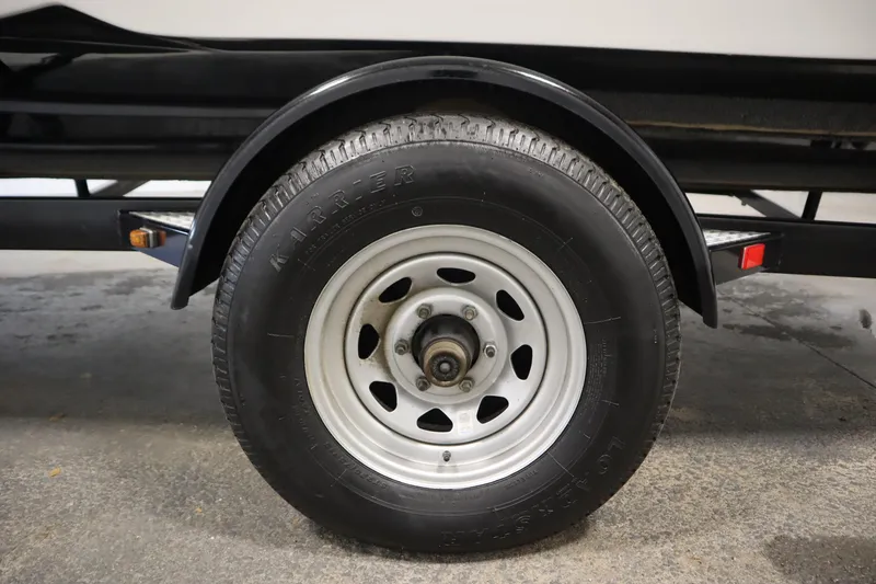 Slide: The Image of Trailer wheel of 2015 Starcraft 1915 OB Limited boat, close-up view. - 43