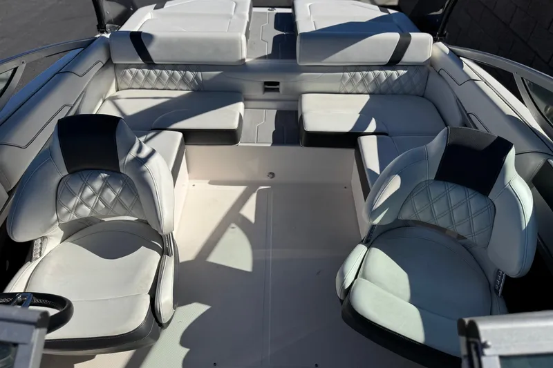 Slide: The Image of 2019 Regal 2100 boat interior with luxurious seating and modern design. - 15