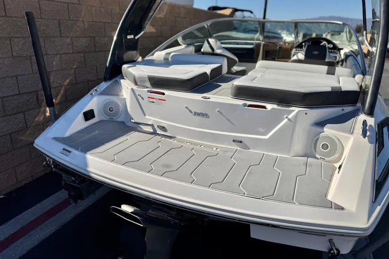 Slide: The Image of 2019 Regal 2100 boat with spacious rear deck and comfortable seating. - 6