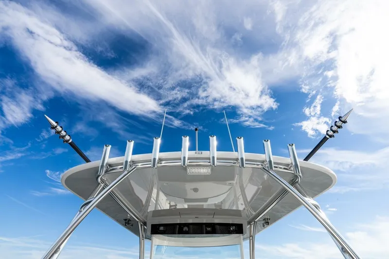 Slide: The Image of 2026 Valhalla Boatworks V-46 with sleek design against a vibrant blue sky. - 57