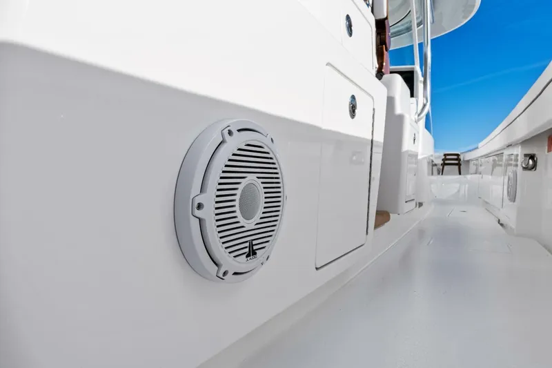 Slide: The Image of 2026 Valhalla Boatworks V-46 deck with speaker, showcasing sleek design and modern features. - 63