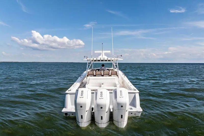 Slide: The Image of 2026 Valhalla Boatworks V-46 on open water, showcasing powerful engines and sleek design. - 83