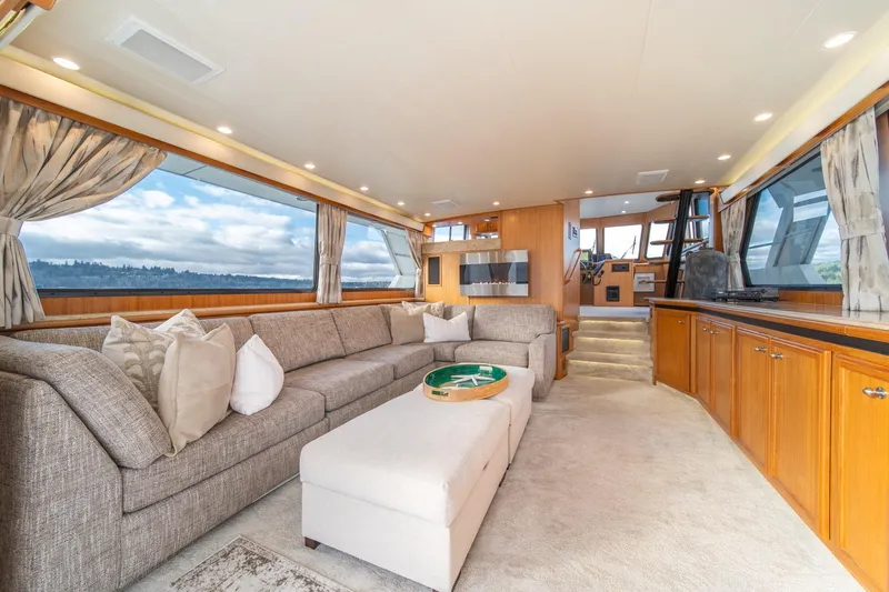 Slide: The Image of Luxurious interior of 1995 Tollycraft 57 Walk Around Pilothouse yacht with spacious seating. - 10