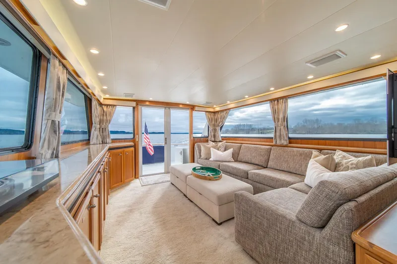 Slide: The Image of Luxurious interior of 1995 Tollycraft 57 Walk Around Pilothouse yacht with panoramic windows. - 11
