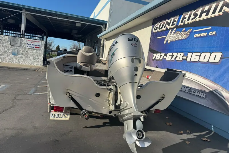 Slide: The Image of 2004 Crestliner 1650 Fish Hawk boat with Honda 90 outboard motor at Gone Fishing Marine. - 3