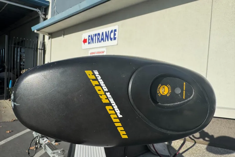 Slide: The Image of Minn Kota Power Drive motor on 2004 Crestliner 1650 Fish Hawk boat, near entrance sign. - 4