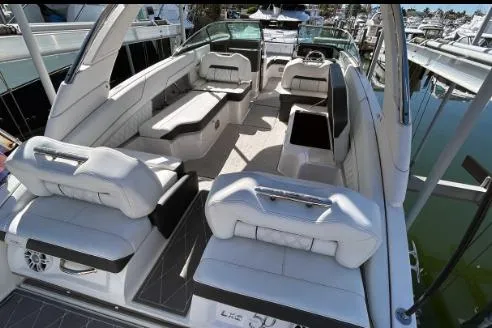Slide: The Image of 2022 Regal LX6 boat interior with luxurious seating and modern design. - 4