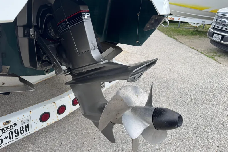 Slide: The Image of 1994 Cobalt 252 boat with Volvo Penta outdrive and propeller, parked on a trailer. - 8