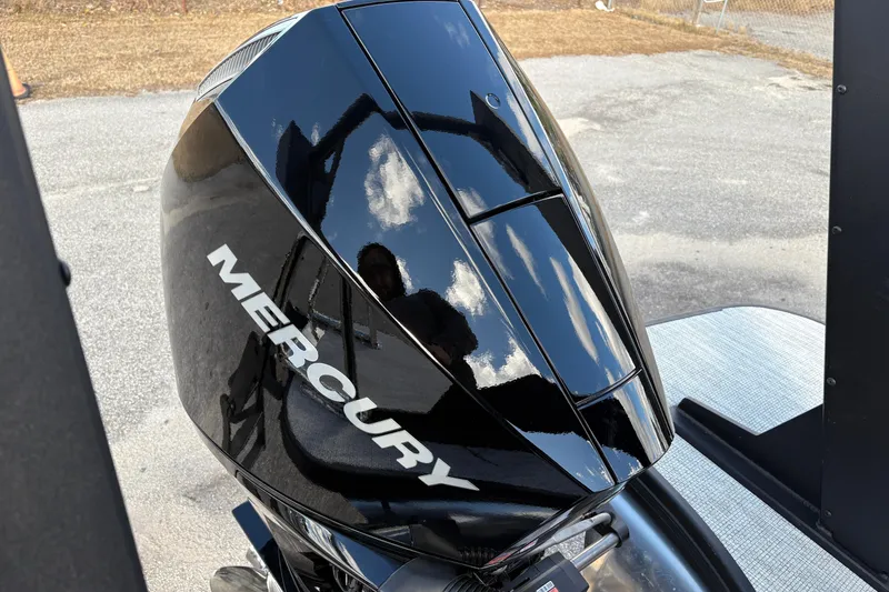 Slide: The Image of Shiny black Mercury outboard motor on Alera M 23Q, 2026 model. - 6