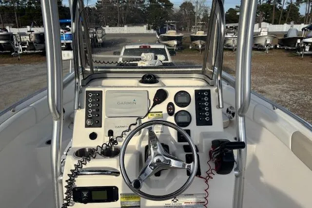 Slide: The Image of 2014 Robalo R222 Center Console boat dashboard with Garmin navigation system. - 12