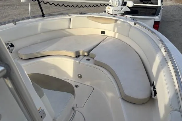 Slide: The Image of 2014 Robalo R222 Center Console boat with spacious seating area. - 14