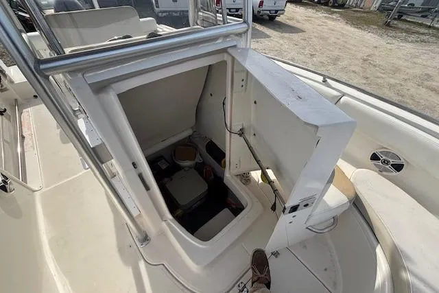 Slide: The Image of 2014 Robalo R222 Center Console boat storage compartment, open and accessible. - 20