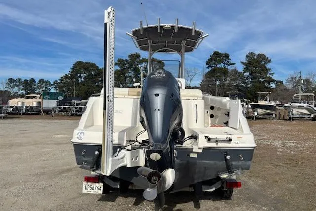 Slide: The Image of 2014 Robalo R222 Center Console boat, rear view, parked outdoors. - 3
