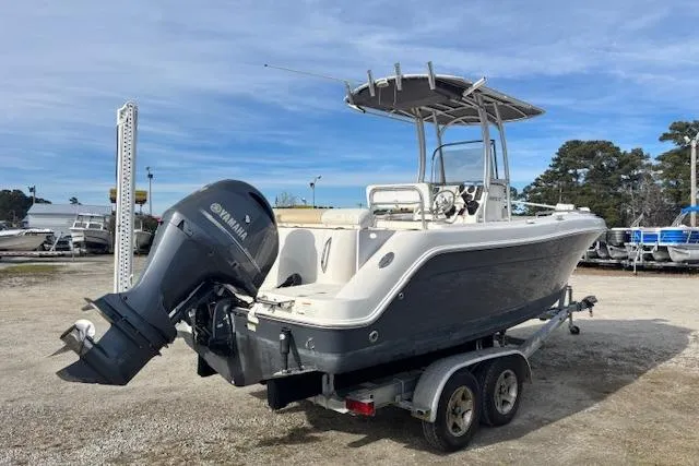 Slide: The Image of 2014 Robalo R222 Center Console boat on trailer with Yamaha outboard motor. - 4
