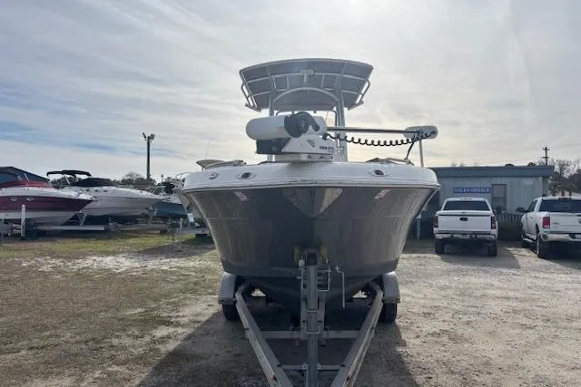 Slide: The Image of 2014 Robalo R222 Center Console boat on trailer, parked outdoors. - 7