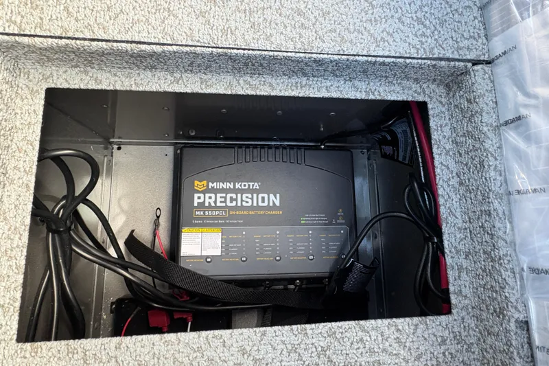 Slide: The Image of Minn Kota Precision MK 550PC battery charger in 2026 Lund 1975 Pro-V Sport boat. - 19