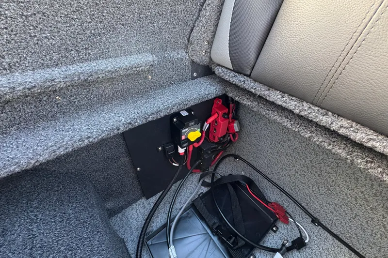 Slide: The Image of Interior of 2026 Lund 1975 Pro-V Sport boat showing electrical components and wiring. - 40