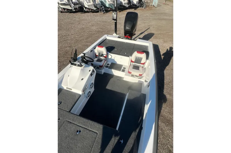 Slide: The Image of 2004 Bumble Bee Pro Vee XT boat with dual seats and steering console. - 33