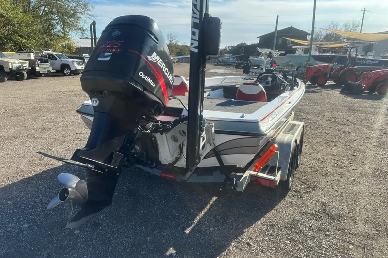 Slide: The Image of 2004 Bumble Bee Pro Vee XT boat with Mercury engine on trailer. - 8