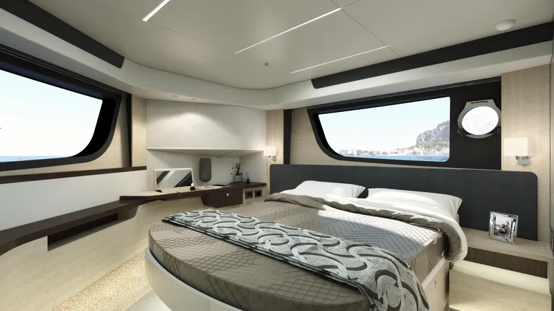 Slide: The Image of Luxurious bedroom interior of the 2024 Absolute 48 Coupe yacht with large windows and modern decor. - 12