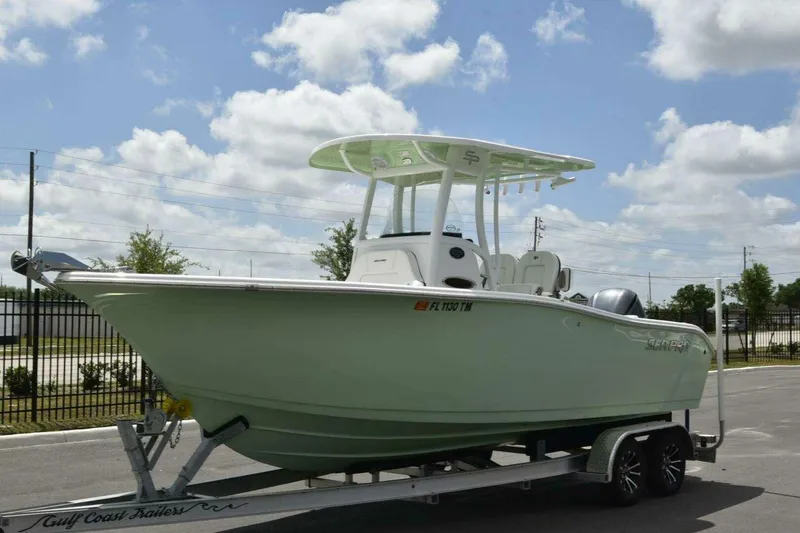 Slide: The Image of 2023 Sea Pro 239 Center Console boat on trailer, outdoor display. - 10