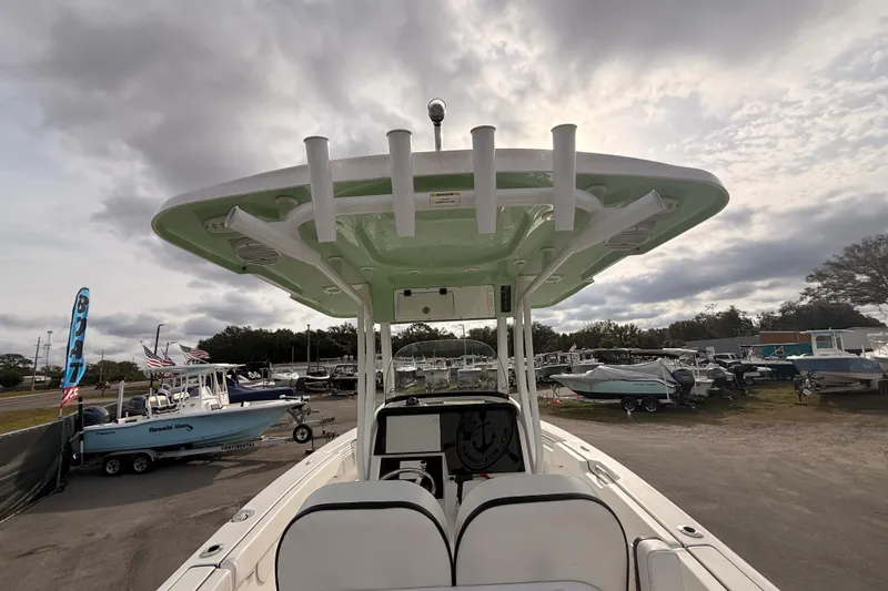 Slide: The Image of Yamaha display on 2023 Sea Pro 239 Center Console showing fuel and trip data. - 25