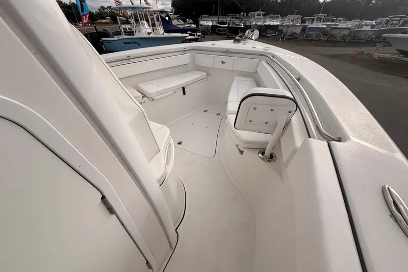 Slide: The Image of 2023 Sea Pro 239 Center Console boat interior with marine toilet and plumbing. - 37