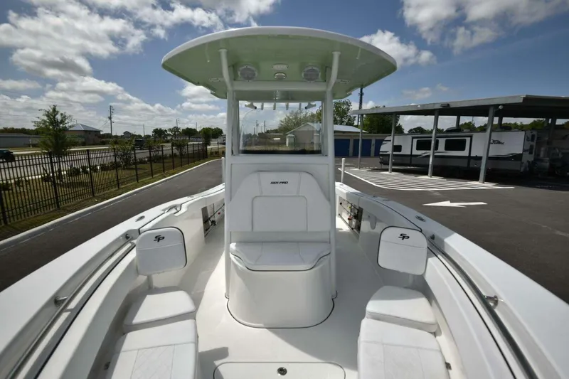 Slide: The Image of 2023 Sea Pro 239 Center Console boat storage compartment with open lid. - 46
