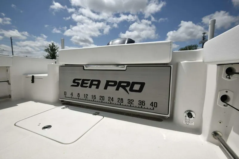 Slide: The Image of 2023 Sea Pro 239 Center Console boat deck with anchor and hatch. - 51