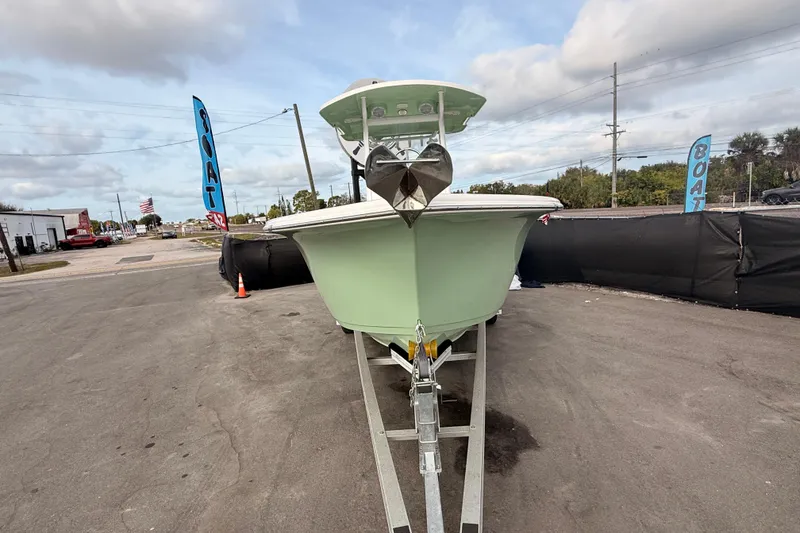 Slide: The Image of 2023 Sea Pro 239 Center Console boat on trailer with Yamaha engine, outdoor display. - 6