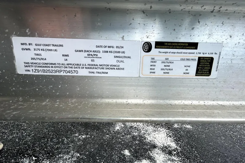 Slide: The Image of 2023 Sea Pro 239 Center Console trailer label, Gulf Coast Trailers, tire and loading information. - 84