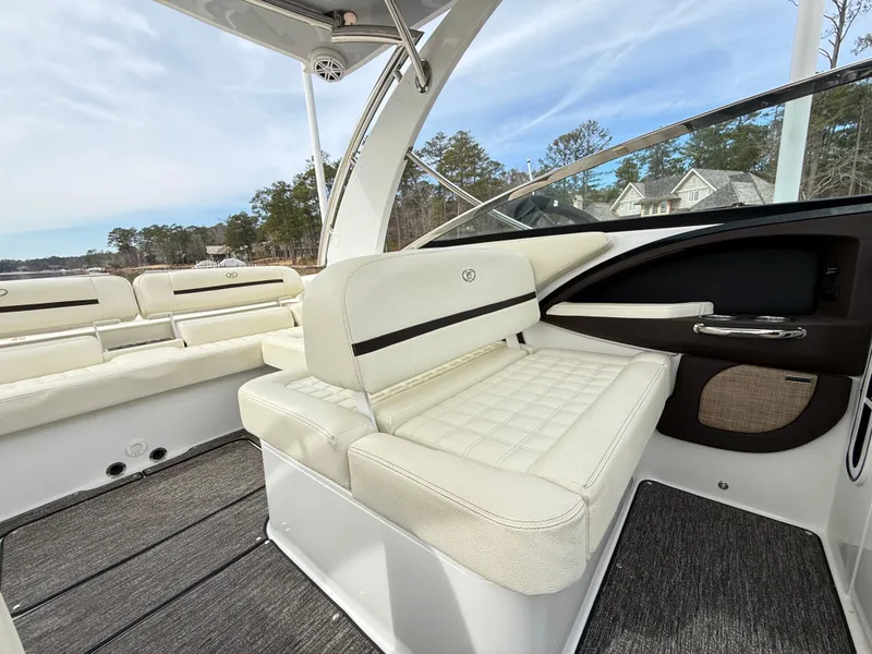 Slide: The Image of Luxurious interior of 2021 Cobalt R30 boat with plush seating and elegant design. - 14