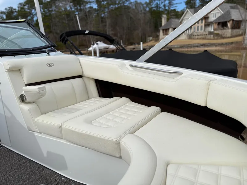 Slide: The Image of Luxurious seating on a 2021 Cobalt R30 boat, featuring elegant white upholstery. - 19