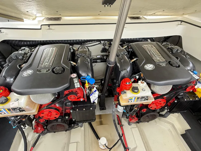 Slide: The Image of Twin engines in a 2021 Cobalt R30 boat, showcasing powerful marine engineering. - 26