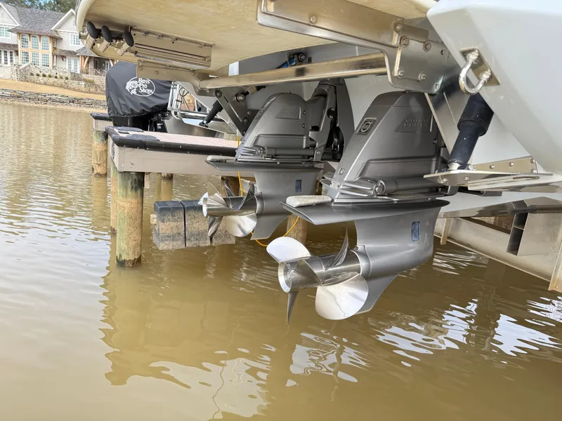 Slide: The Image of 2021 Cobalt R30 boat with dual outboard motors in shallow water. - 28