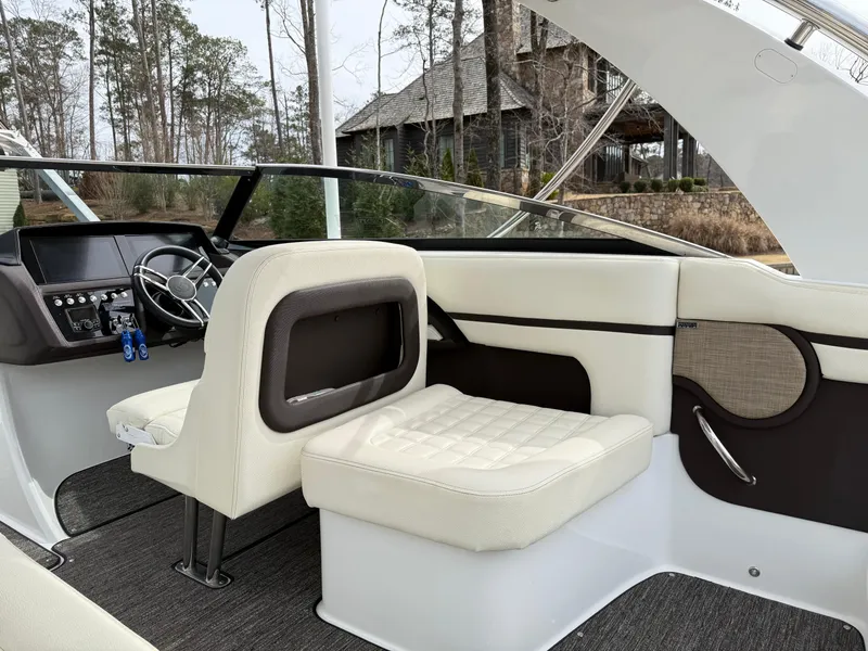 Slide: The Image of Interior of a 2021 Cobalt R30 boat with luxurious seating and modern dashboard. - 8