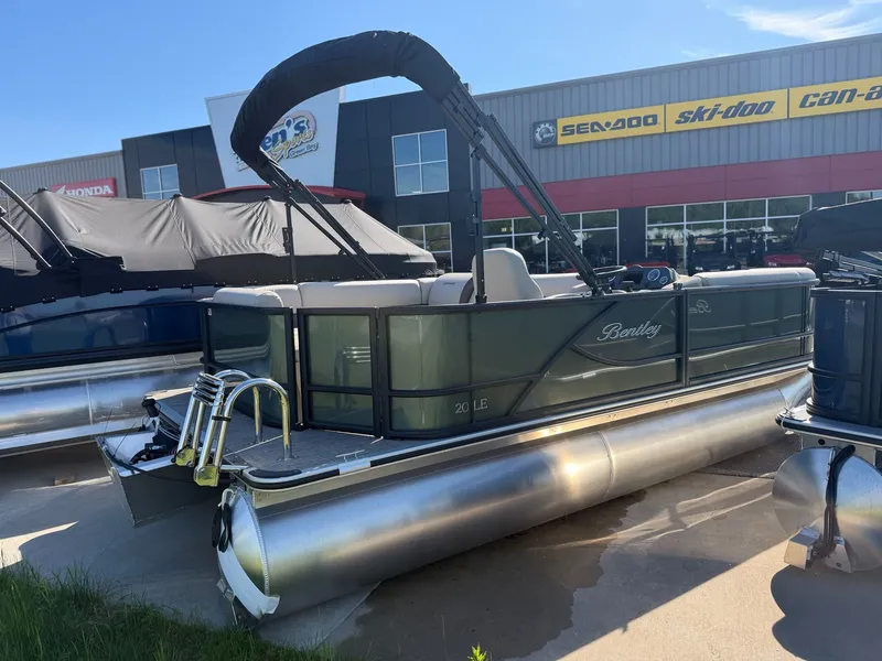 Slide: The Image of 2026 Bentley Pontoons LE 200 CR in front of a showroom. - 3