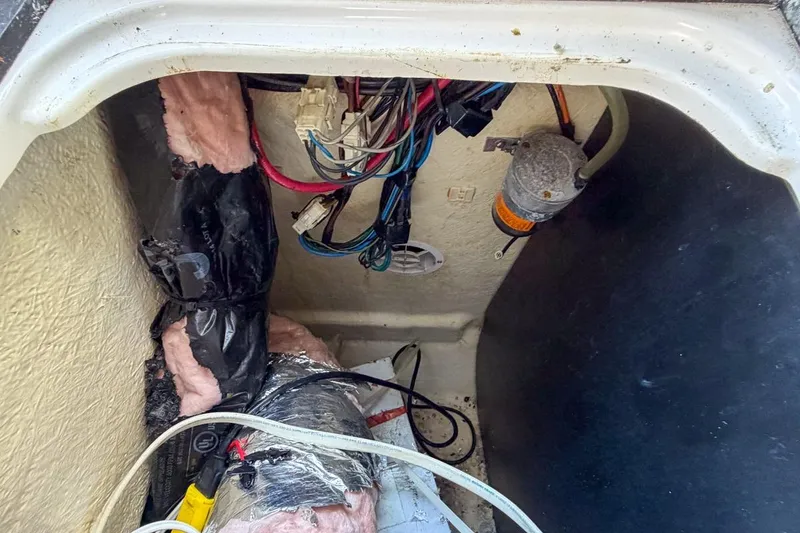 Slide: The Image of Interior of 2015 Regal 38 Express yacht with TV and skylight. - 113