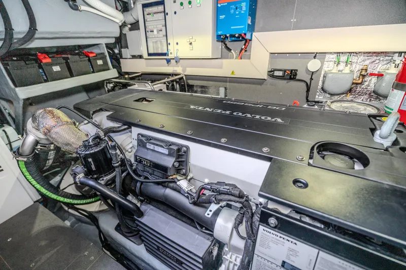 Slide: The Image of Engine room of 2026 Absolute 48 Coupe with Volvo Penta engine components. - 55