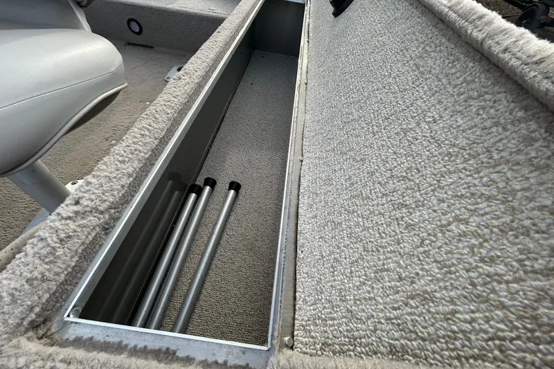 Slide: The Image of Interior view of 2003 Lund 1650 Explorer SS boat storage compartment. - 29
