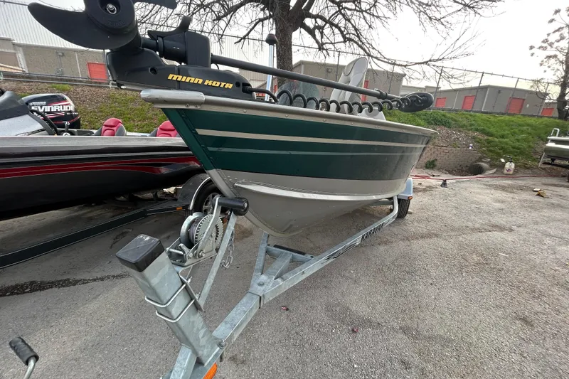 Slide: The Image of 2003 Lund 1650 Explorer SS boat on trailer with Minn Kota motor. - 32