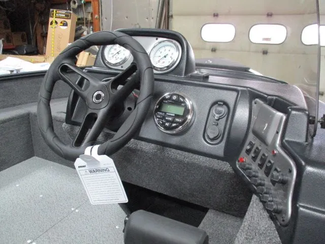 Slide: The Image of Dashboard of 2026 Lund 1650 Angler SS with steering wheel and gauges. - 5