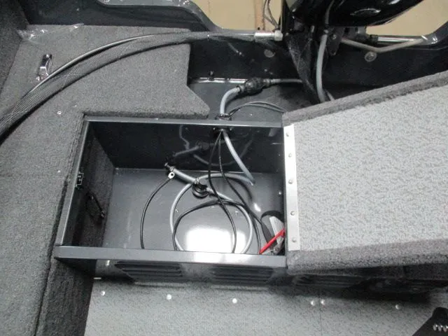 Slide: The Image of Interior view of 2026 Lund 1650 Angler SS with storage compartment. - 7